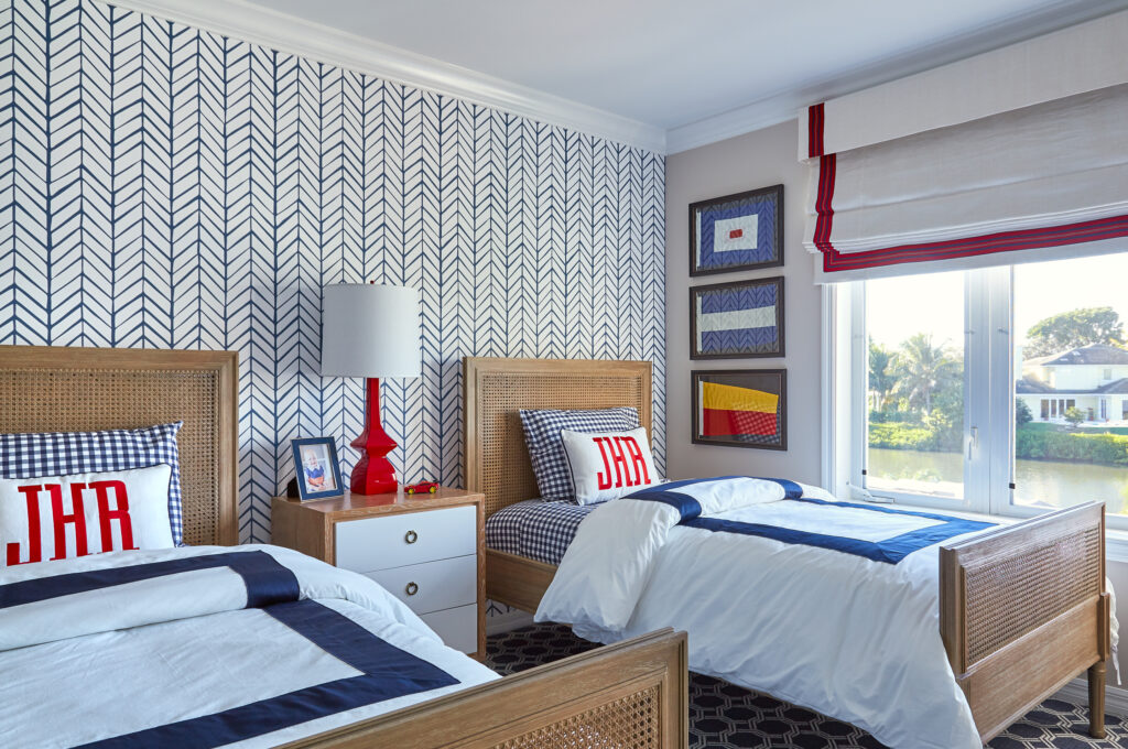 Junior bedroom with twin beds and nautical accents