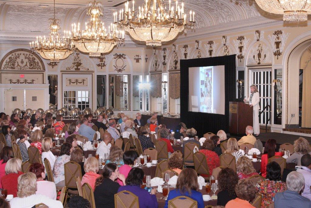 Libby Langdon speaking at a conference for interior design