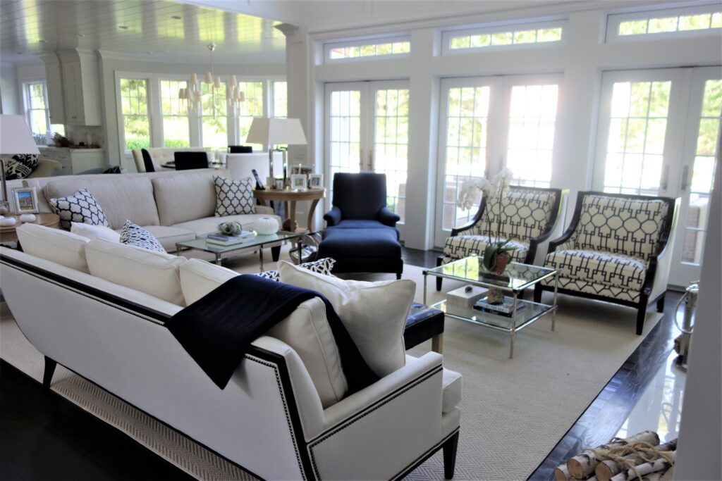 navy and white living room with French doors