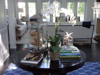 foyer with blue and white rug