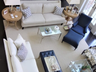 Open floor plan with shades of blues and whites