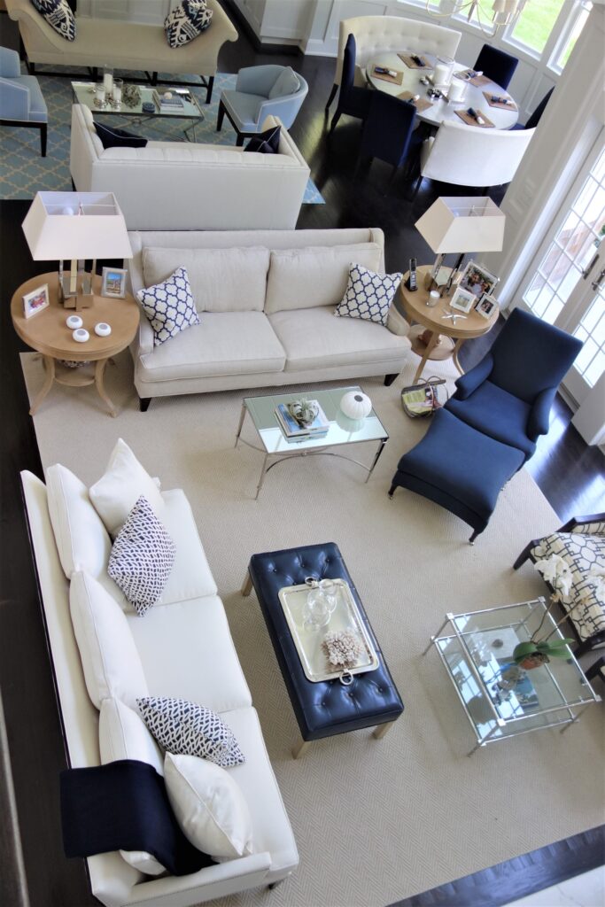 Open floor plan with shades of blues and whites