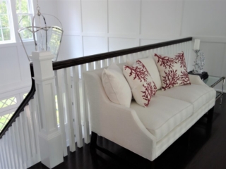 DSC03781 White sofa with red coral accent pillows