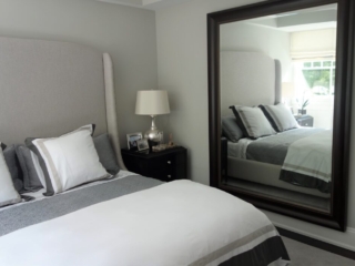Oversized dark wood mirror for bedroom