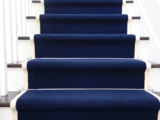 blue stair runner with silver stair rod design