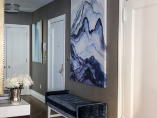 NYC Modern entry way with ottoman and artwork natural light