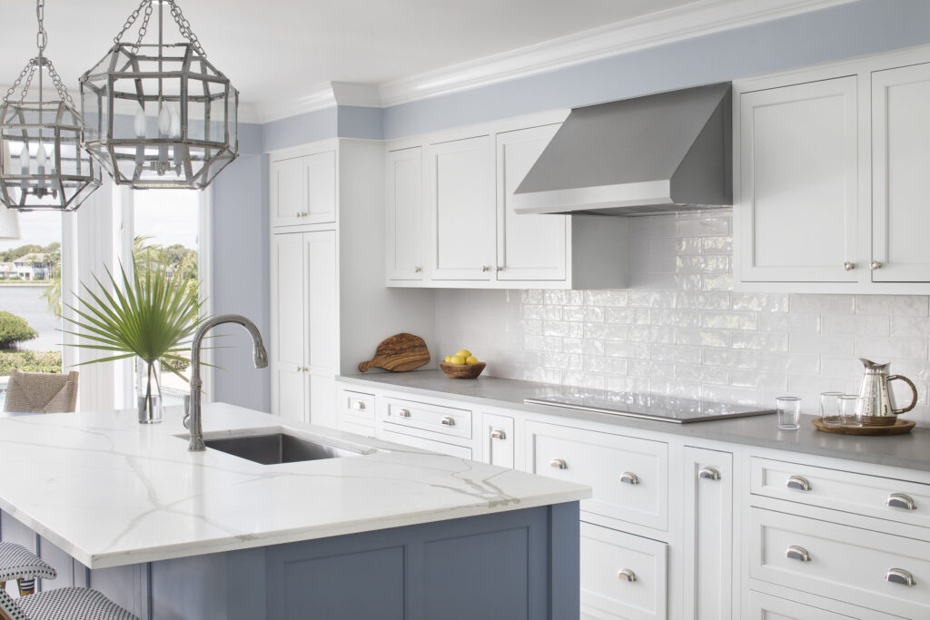 White cabinets with white backslash and chrome hardware