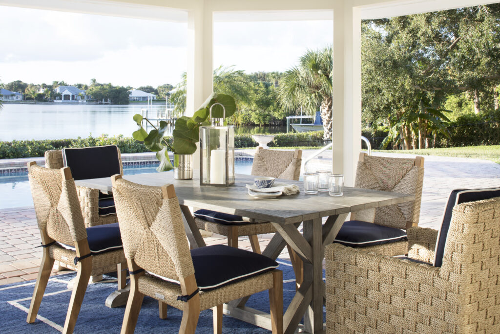Outdoor dining set with navy cushions