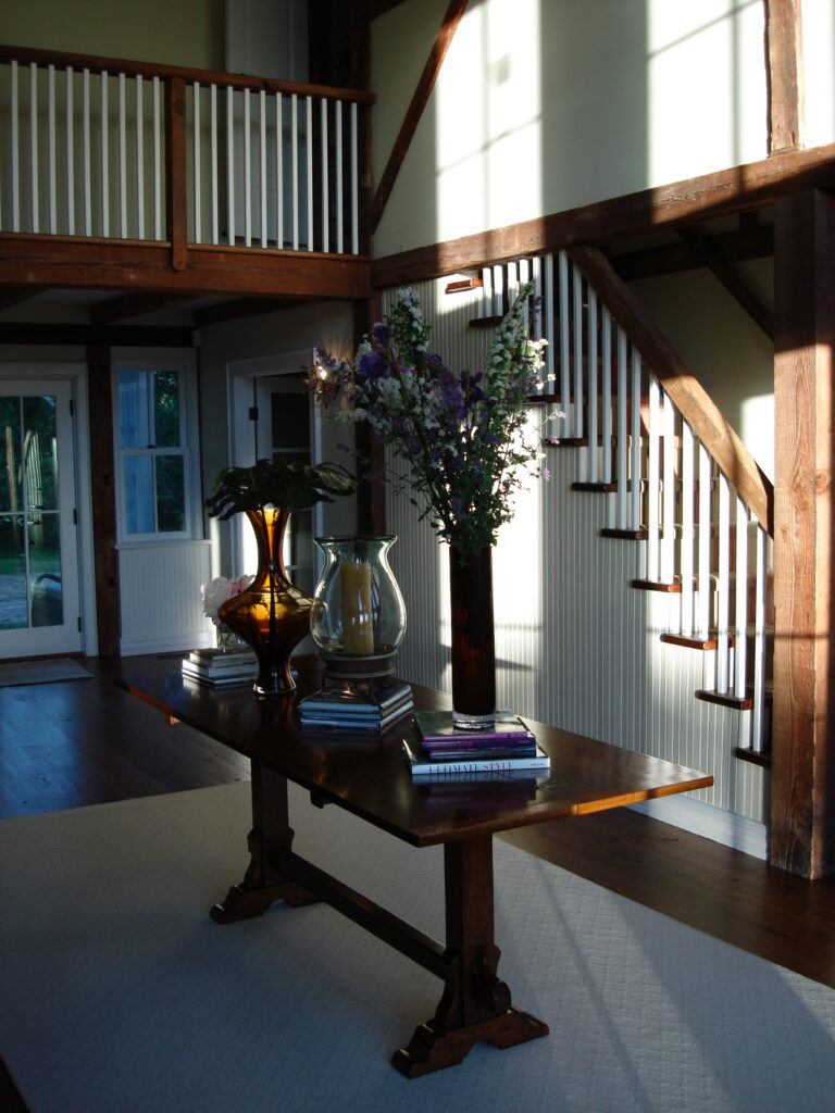 Foyer with white and wood finishes