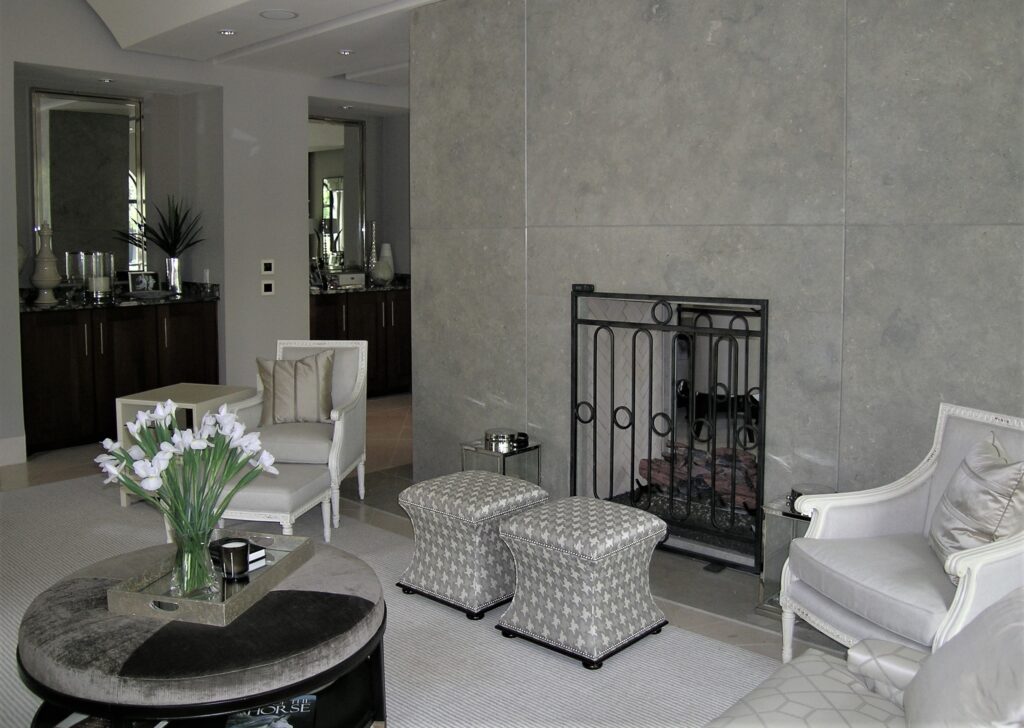 Gray stone wall with fireplace