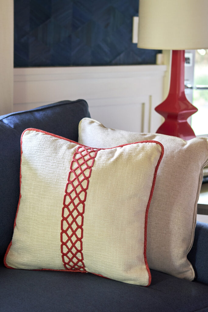 Coral and white throw pillow