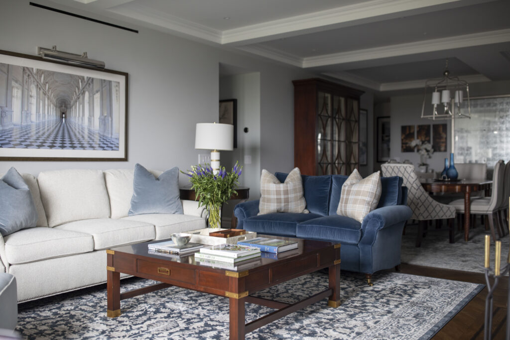 blue and gray living room with walnut accents