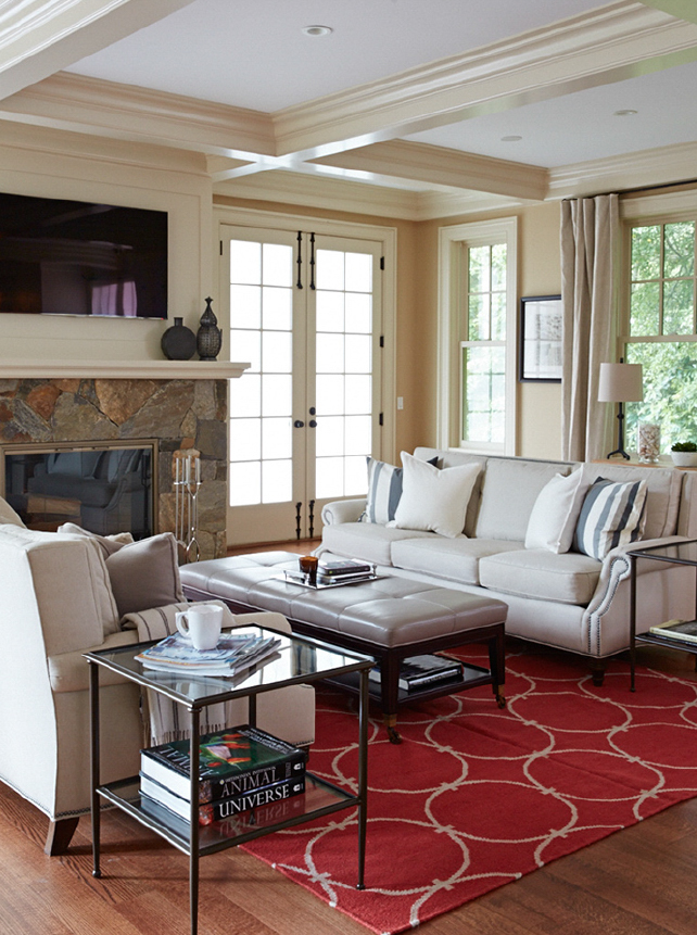 Neutral living room with red carpet