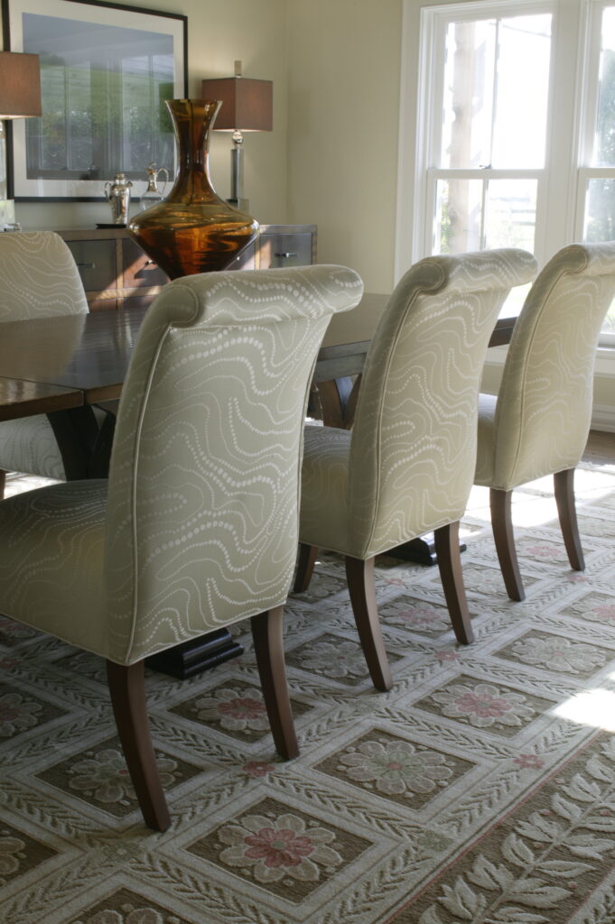 Creme dining room chairs with walnut