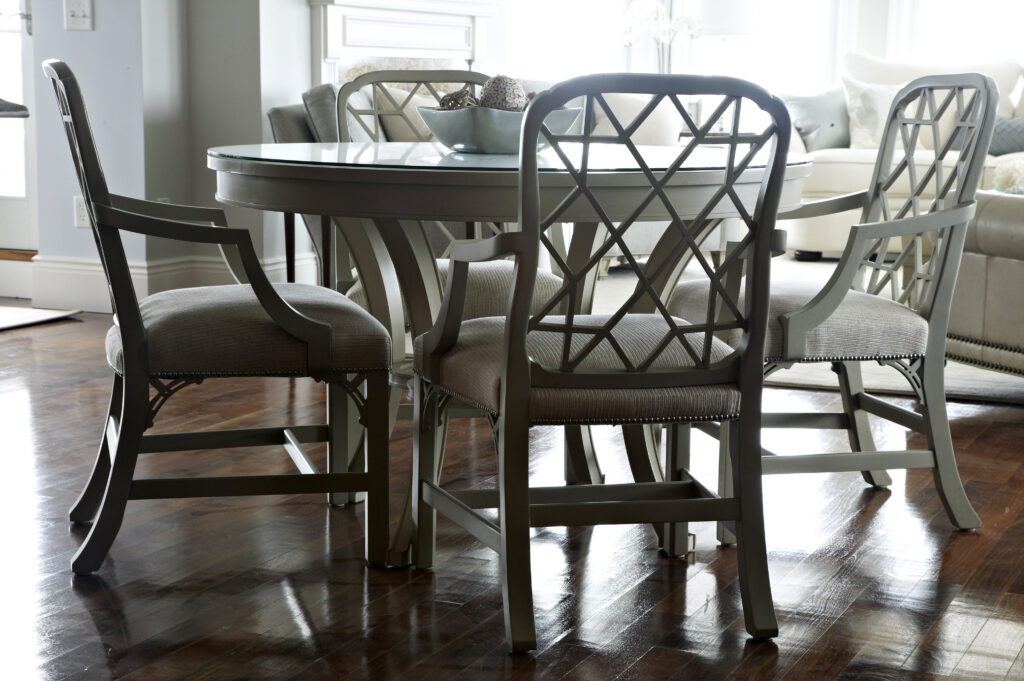 Round dining table with wood and fabric chairs