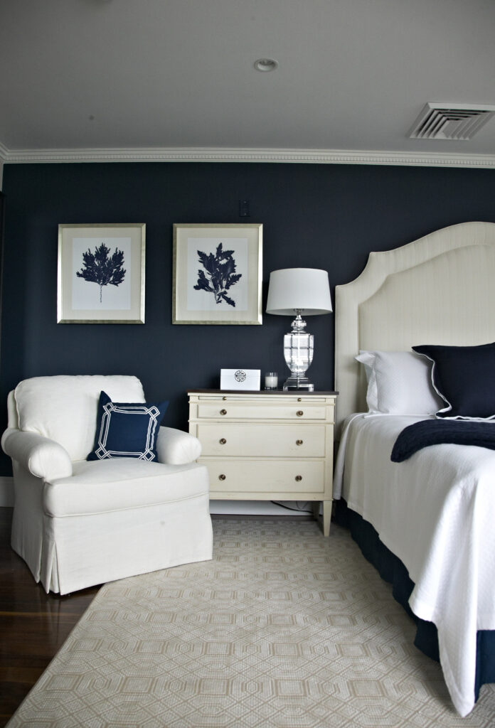 Navy accent wall with navy coral artwork