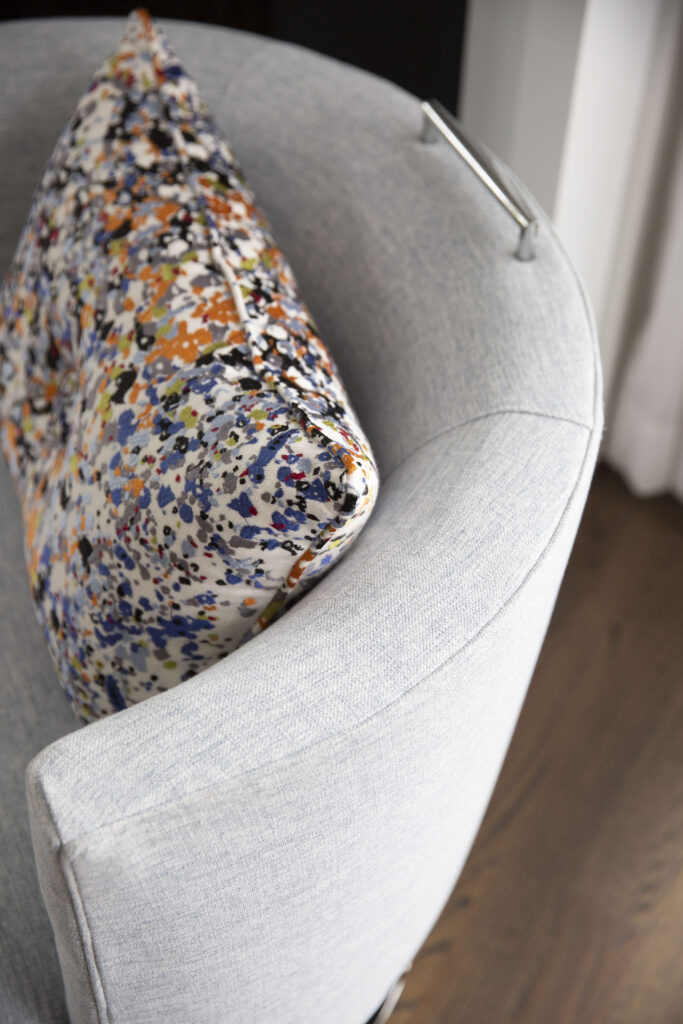Gray fabric barrel chair
