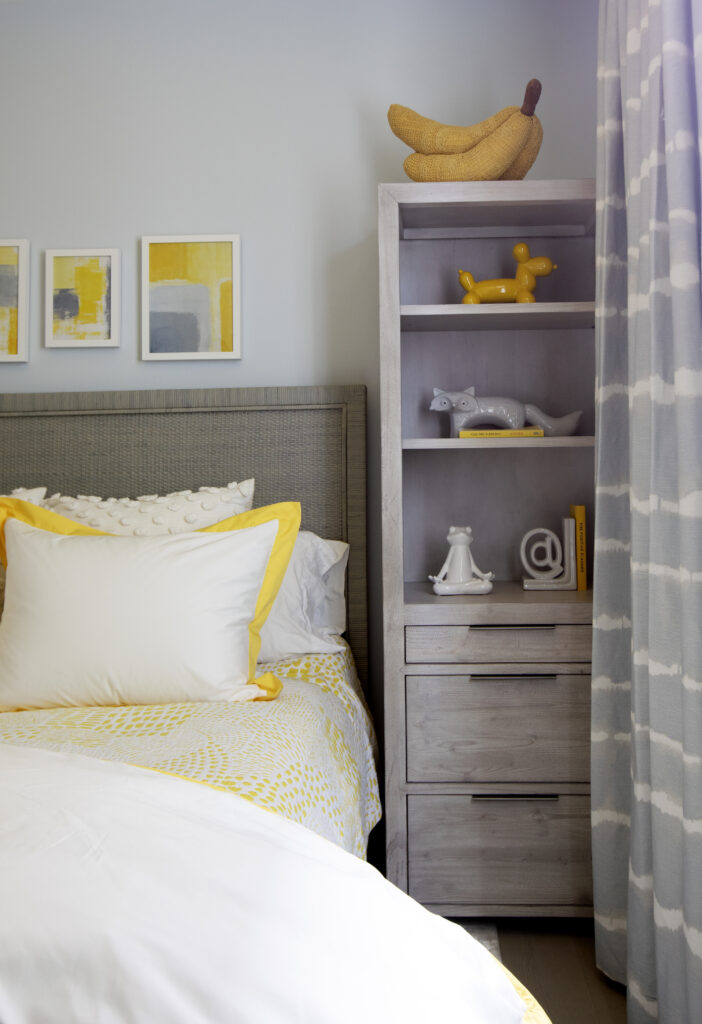 White, gray, and yellow bedroom