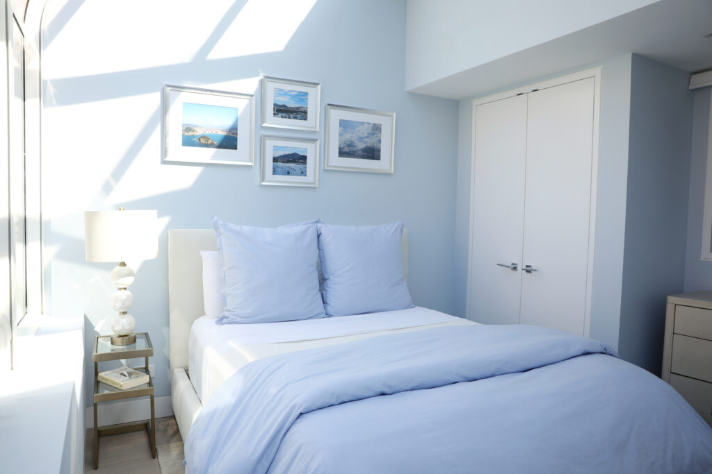 Sunlit blue bedroom