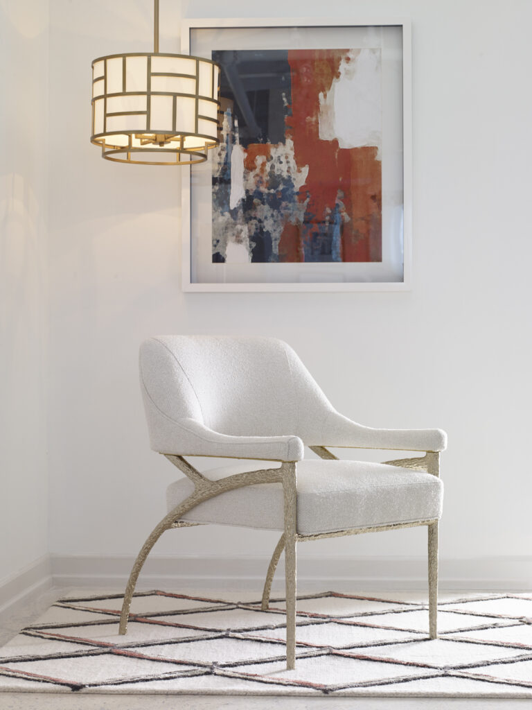 Light fabric chair with gold legs