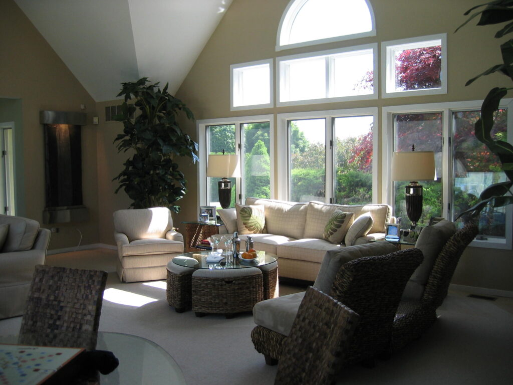 Large windows and high ceilings in living room