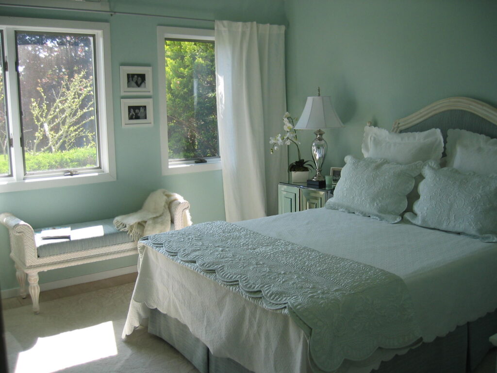 Light green and white bedroom