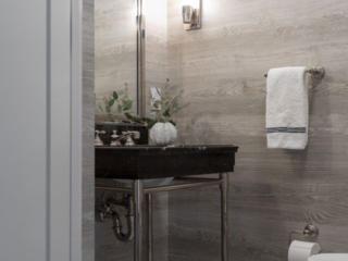 Wood stone bathroom with chrome finishes