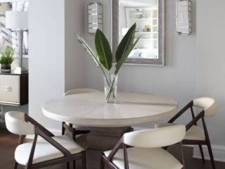 dining area with a round walnut and white table set