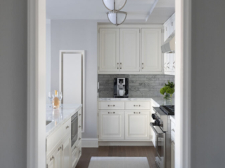 Kitchen hallway with chrome and white ceiling lights