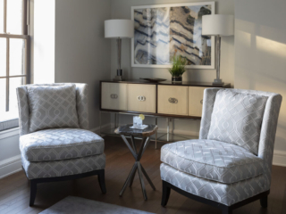 silver and white sitting chairs with wood console