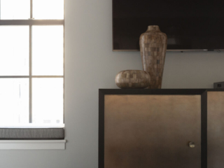 Bronze and black entertainment console