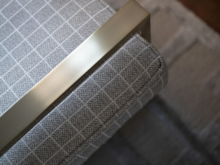Contemporary bench with gray and gold accents