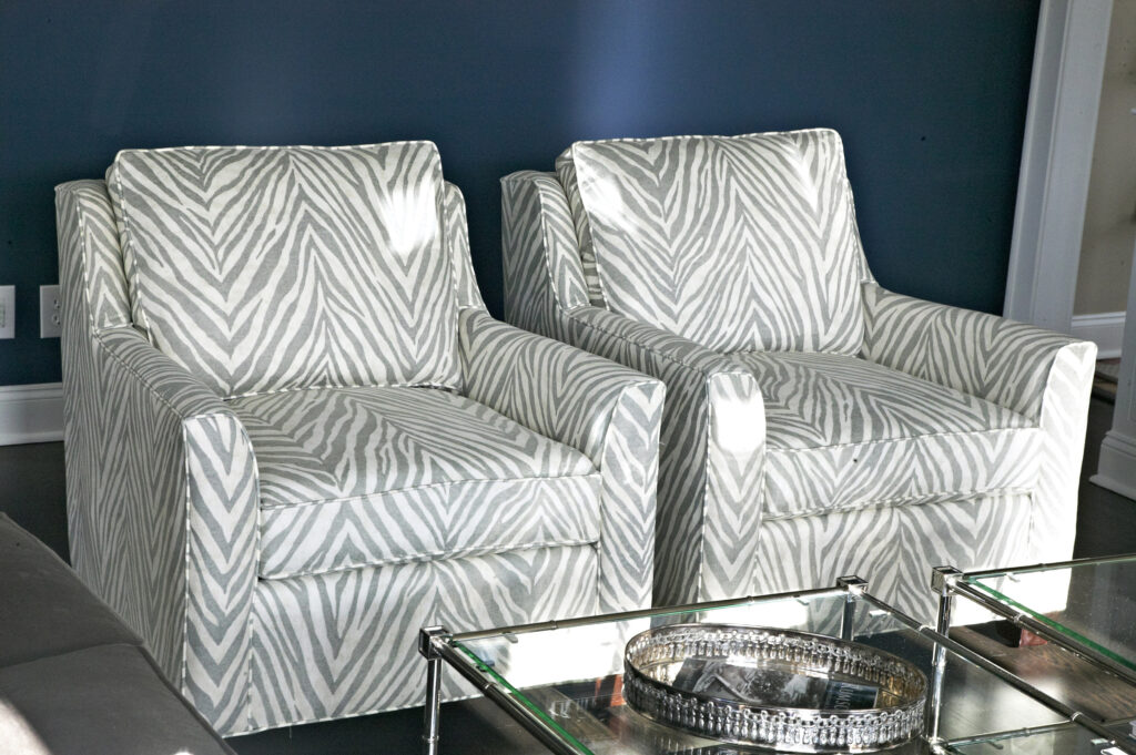 Zebra patterned arm chairs
